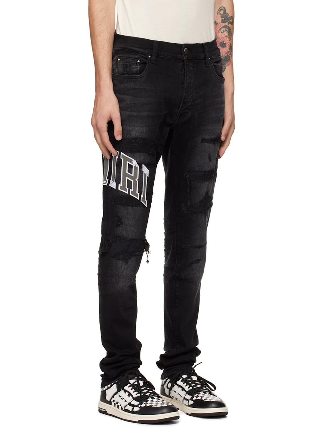 AMIRI VARSITY LOGO REPAIR JEANS-black