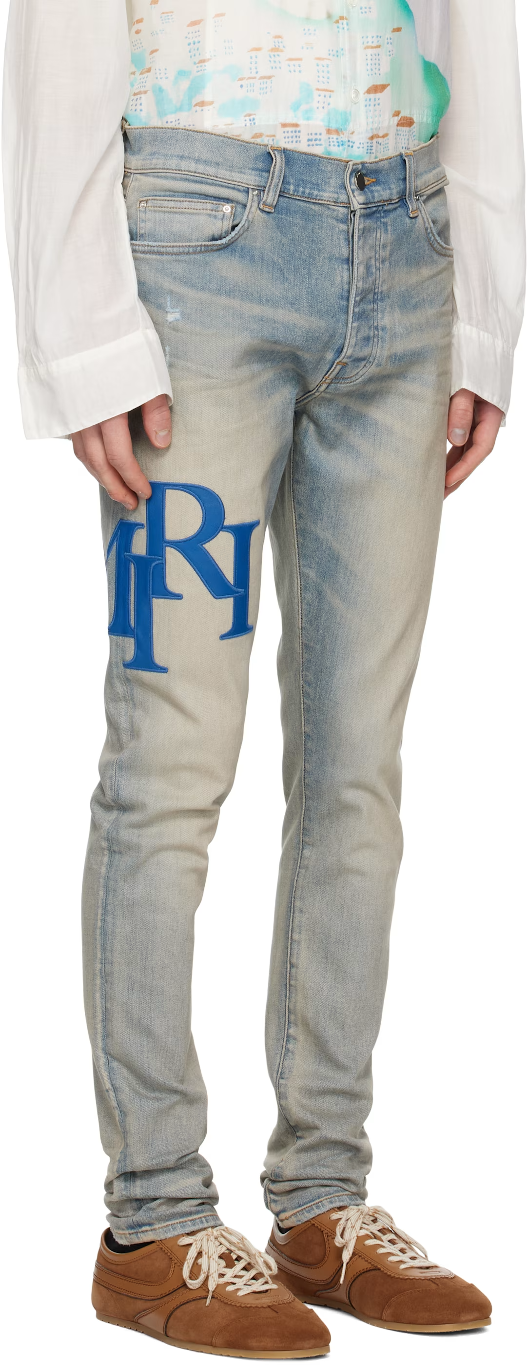 AMIRI STAGGARED LOGO JEANS